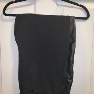 Black leggings with leather strip